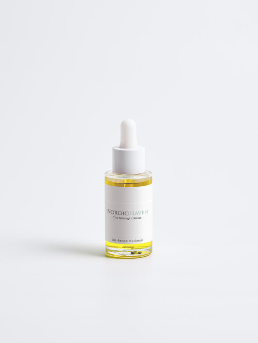 The Midnight Reset is a plant-based **Plant-Powered Smoothing Routine** designed for the sensitive soul.

We swapped harsh synthetic actives for Bakuchiol, a gentle Nordic favorite that mimics the smoothing power of high-performance actives without the sting, redness, or "purge." Blended with organic Jojoba and Rosehip, this golden oil works while you rest—smoothing fine lines and restoring your glow by morning.
