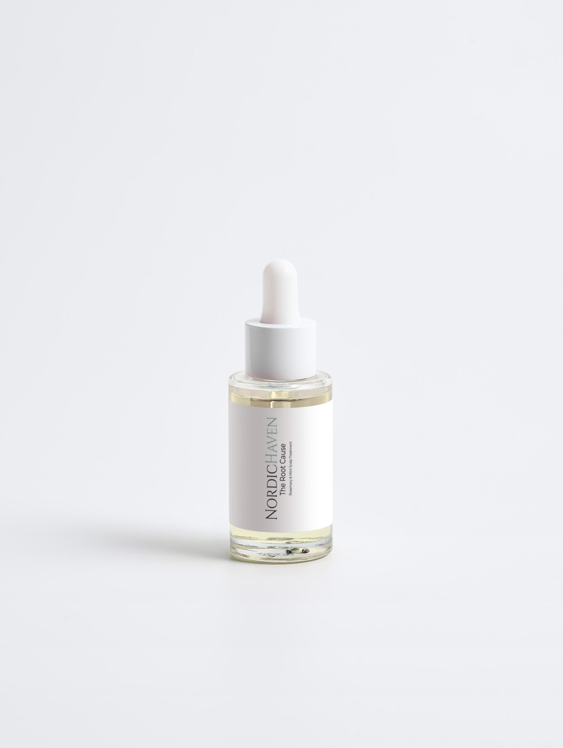 The Root Cause is a concentrated oil designed to **visibly support density and invigorate the scalp.**

Powered by viral Rosemary Oil—which **supports the look of density and volume**—and cooling Peppermint, it invigorates the roots while nourishing dry scalps with Almond and Castor Oils.