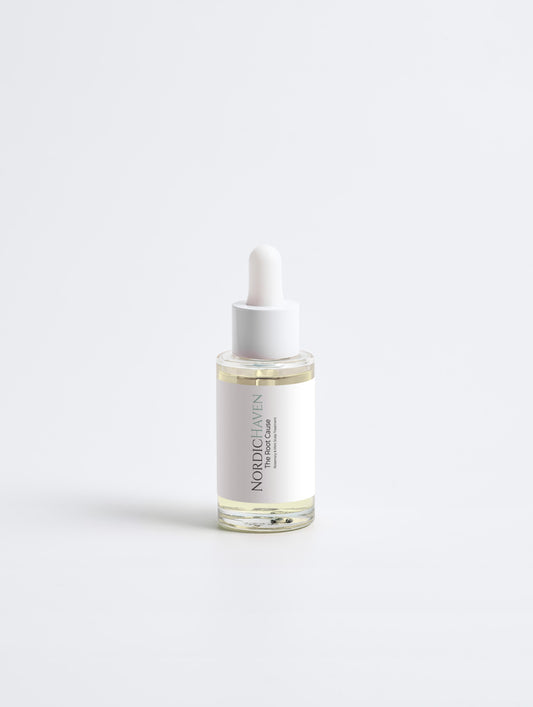 The Root Cause is a concentrated oil designed to **visibly support density and invigorate the scalp.**

Powered by viral Rosemary Oil—which **supports the look of density and volume**—and cooling Peppermint, it invigorates the roots while nourishing dry scalps with Almond and Castor Oils.